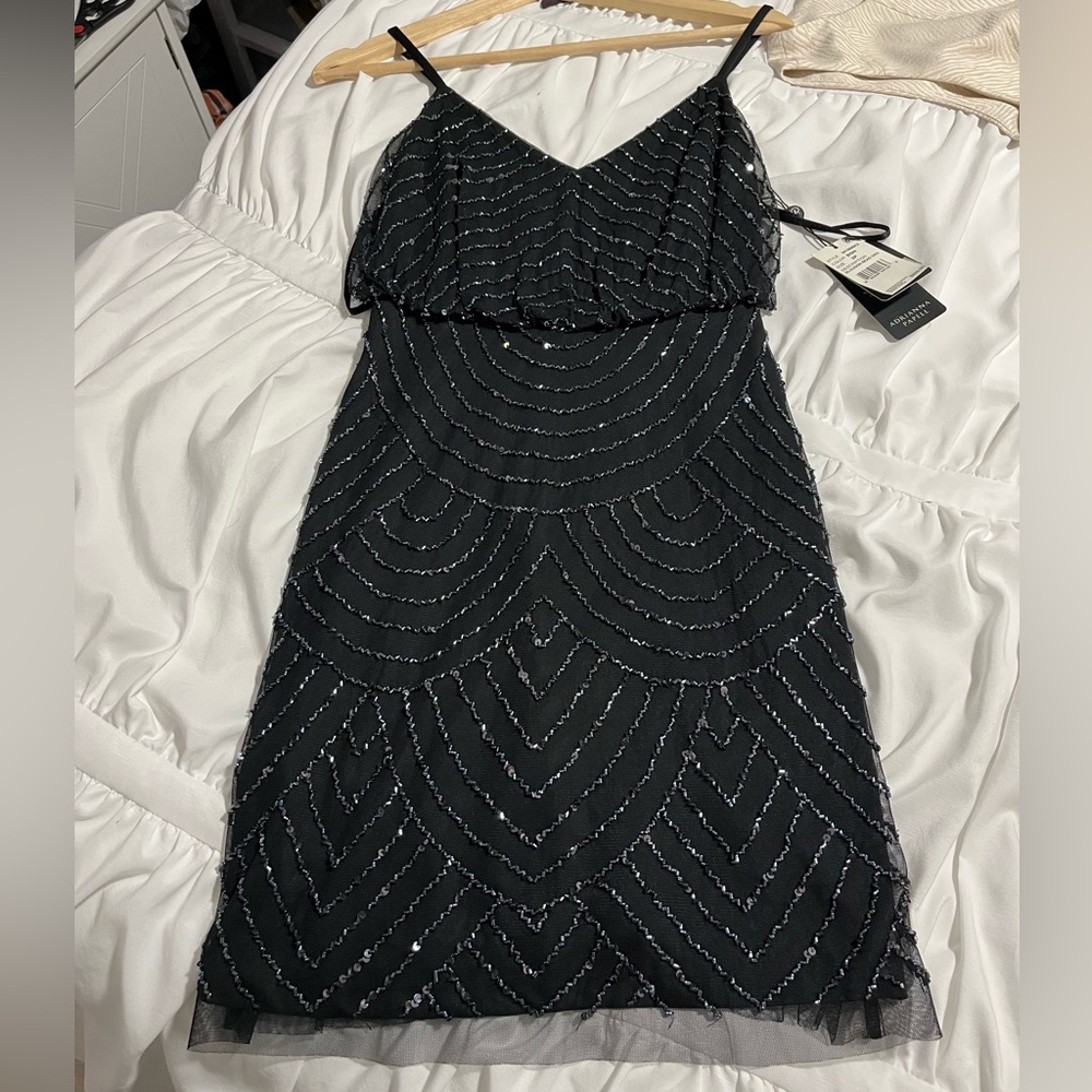 Black beaded dress.